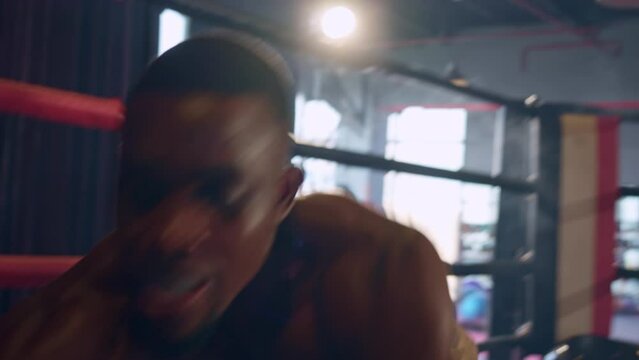 African American sportsman loser having a competition in fitness club. 