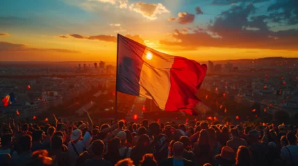 Foto op Canvas The flag of France is developing against the background of sunset Paris, preparation of the streets of the city for the Olympic Games, top view of the city, crowd of fans, top view © Irina