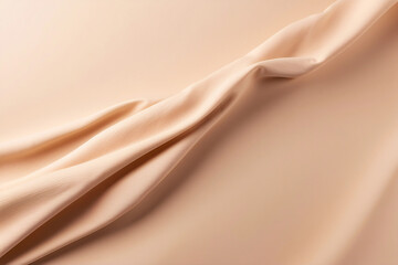 Fototapeta premium The image shows a close-up of smooth satin fabric creating a luxurious and sophisticated texture in soft neutral tones