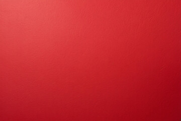 Fototapeta premium A high-quality image of bright red textured paper, providing a vibrant and bold background