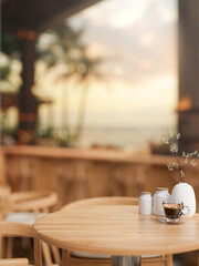 A round wooden table in a cozy luxury beachfront hotel lounge or restaurant.
