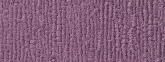 Texture of dark purple fluffy woolen textile background from soft fleecy material, macro. Structure...