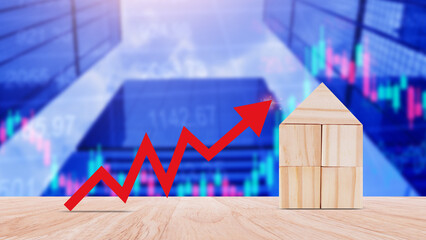 a red up arrow and wooden house. The concept of the rising price of real estate, high demand for...
