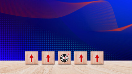 Target concept, objective, virtual target board and rising arrows screen printed on wooden cubes. set goals for business success.