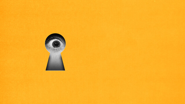 Wide open female eye looking into keyhole on yellow background. Contemporary art collage. Unexpected discoveries. Conceptual design. Concept of creativity, abstract art, imagination and inspiration.