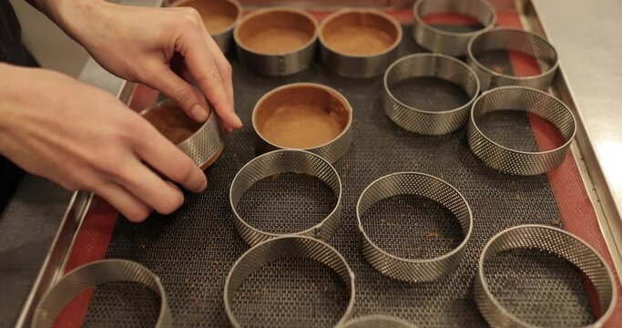 Preparation of tartlets by a professional confectioner. The process of making tartlets