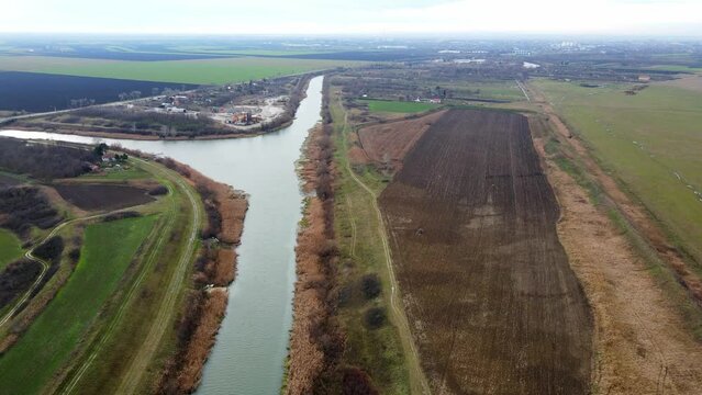 Aerial view of river Bega towards its confluence with canal DTD near town