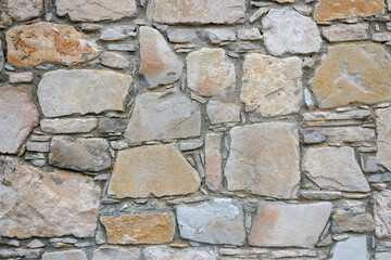 Old weathered  limestone brick wall texture background
