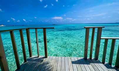 Stairs down with  leisure of  wooden balcony to seaside tropical in summer holiday ,Maldives