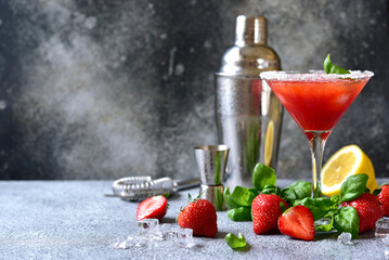 Cold summer strawberry cocktail with lemon and basil in a  martini  glasses . - 781942330