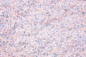 close-up view of a pink granite stone, texture for backgrounds