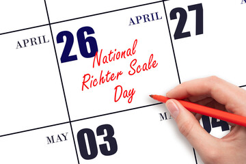 April 26. Hand writing text National Richter Scale Day on calendar date. Save the date.