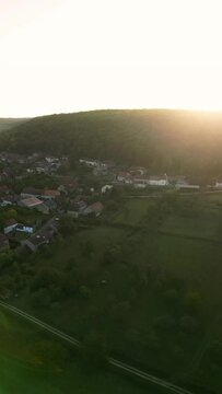Aerial Vertical View of Bouguignon les Moray a small Village in Bourgogne France Early Morning with mist and Sunrise . High quality 4k footage