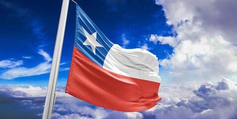 Chile national flag cloth fabric waving on beautiful Blue Sky Background.