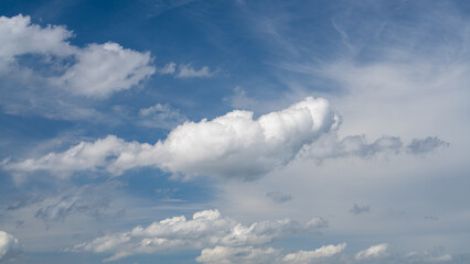blue sky background with big and small clouds