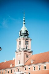 Vertical shot of a church tower in Warsaw on a sunny day, Poland