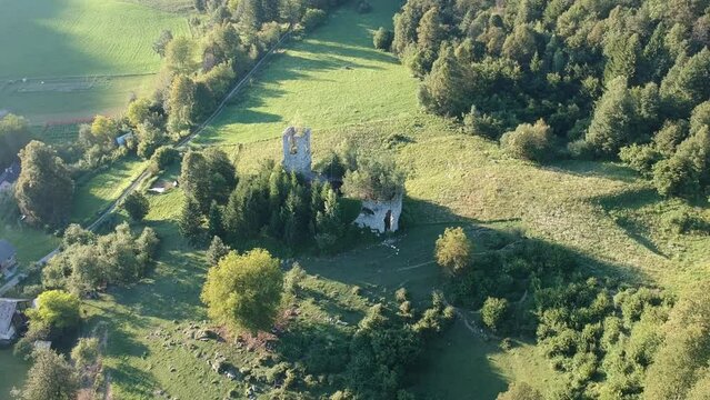 Old, abandoned church, rural landscape, with fresh green meadows ,forest, pasture, Kolpa, Slovenia