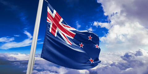 New Zealand national flag cloth fabric waving on beautiful Blue Sky Background.