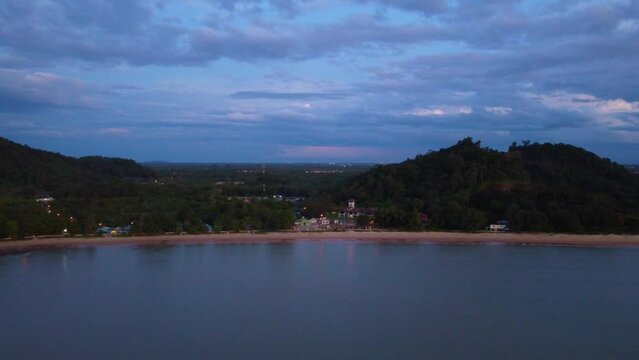 Aerial video of a beautiful sunset at Pasir Pandak beach, Santubong Sarawak, Malaysia