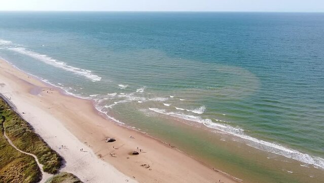 Aerial view of Omaha Beach in a sunny day, in Normandy, France. 4K