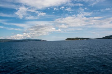 Beautiful shot of the blue sea during cruise from Amaliapoli to Skiathos islands in Greece