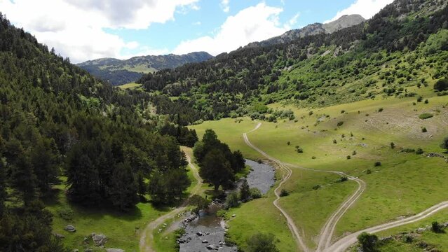 Aerial Drone Footage Pyrenees
 mountains in a sunny day.  Montgarri. Val d'Aran, Lleida, Spain.