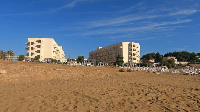 Beach and hotel of Eloro in Noto, Sicily, Italy on a sunny day