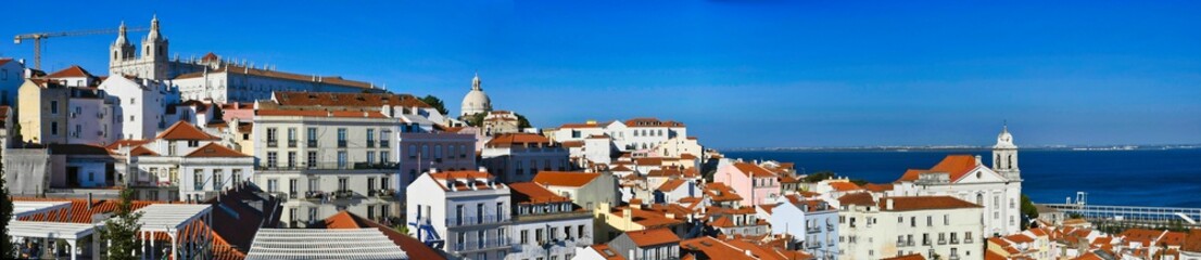 Naklejka premium Panoramic view of Alfama, with San Vicente de Fora and San Miguel in Lisboa, Portugal