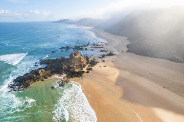 Aerial droe view of beautiful natural Cordoama beach in Portugal Atlantic coast - 781985313