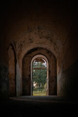 Fototapeta premium Old fortress with arch concrete walls