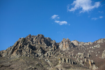 Mountains in spring Crimea against a background of blue sky and bright sunlight