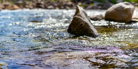 Closeup of a flowing rocky river