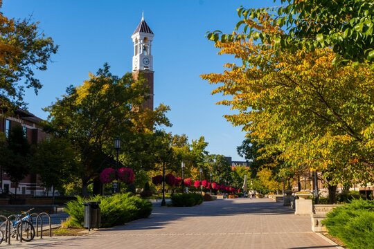 Bell tower surrounded by colorful autumn trees in West Lafayette Campus, Indiana