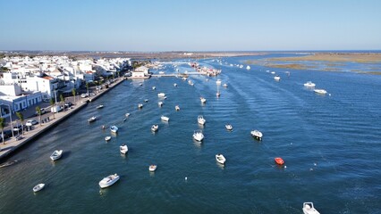 Aerial view of many boats and yachts in the water in Santa Luzia, Algarve, Portugal