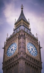 Fototapeta na wymiar Historic Big Ben tower against a cloudy sky in London, UK