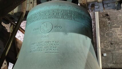 Old metal bell with writings and the soviet symbol