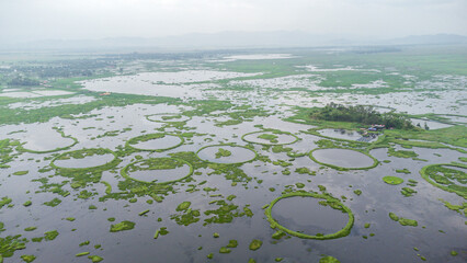 Aerial view loktak lake is the largest freshwater lake and thanga village in India as well as the...