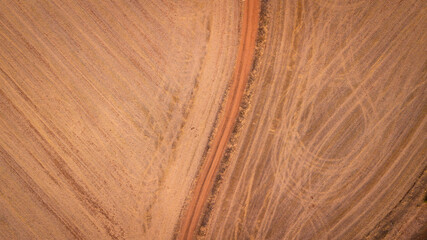 Orange road in the desert off road concept scenic place. Abstract nature background drone aerial...