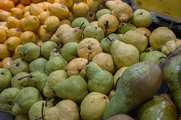 Riga, Latvia. August 30h 2023. Assortment of fresh fruits arranged in the grocery store on the...