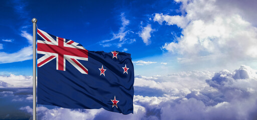 New Zealand national flag cloth fabric waving on beautiful Blue Sky Background.