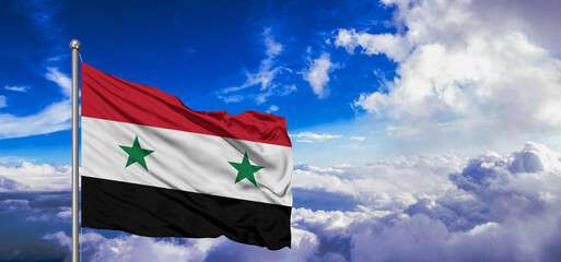 Syria national flag cloth fabric waving on beautiful Blue Sky Background.