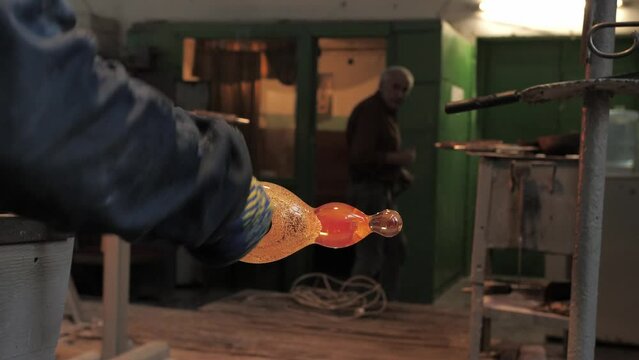 The process of making glass decor with glassblower