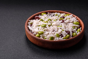 Delicious white cooked rice with green edamame beans with salt and spices