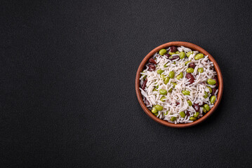 Delicious white cooked rice with green edamame beans with salt and spices