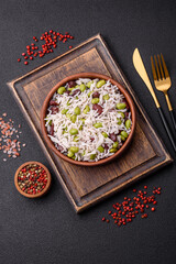 Delicious white cooked rice with green edamame beans with salt and spices