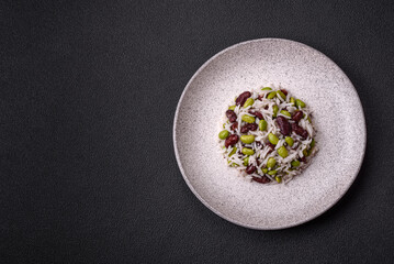 Delicious white cooked rice with green edamame beans with salt and spices