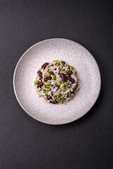 Delicious white cooked rice with green edamame beans with salt and spices