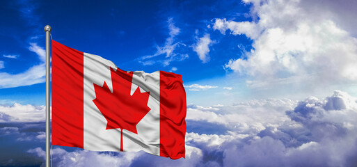 Canada national flag cloth fabric waving on beautiful Blue Sky Background.