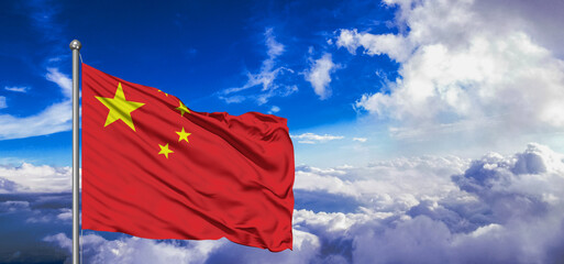 China national flag cloth fabric waving on beautiful Blue Sky Background.