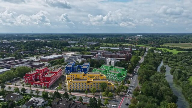 An aerial drone view of colorful buildings in M&uuml;nster, Germany.